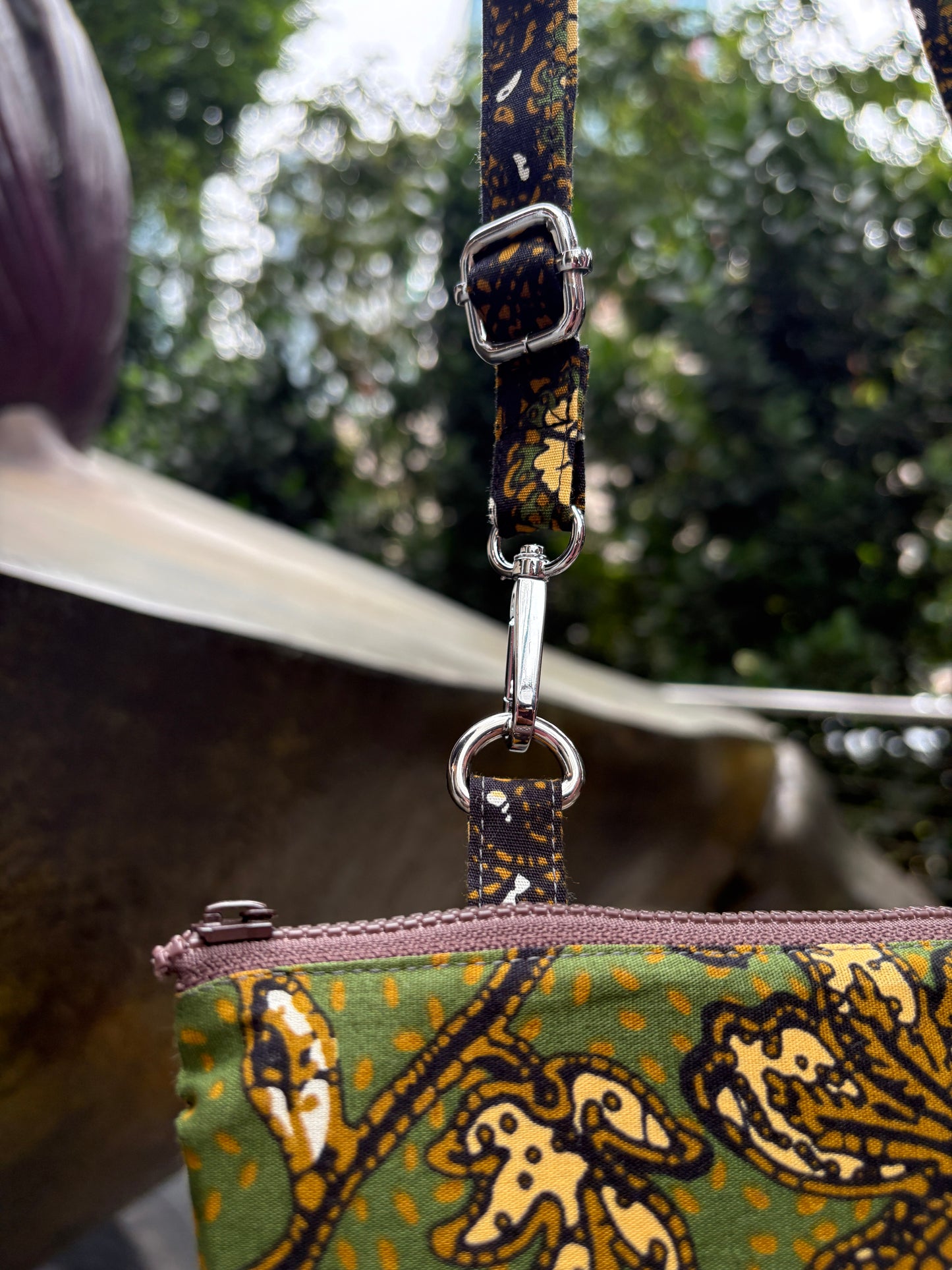 Green Batik crossbody bag with adjustable Batik strap and YKK zipper, handcrafted in Singapore.