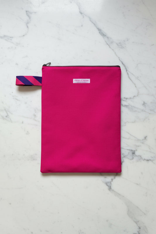 Bright pink laptop sleeve made from Japanese canvas, can fit 13 or 14 inch laptops, handmade in Singapore.