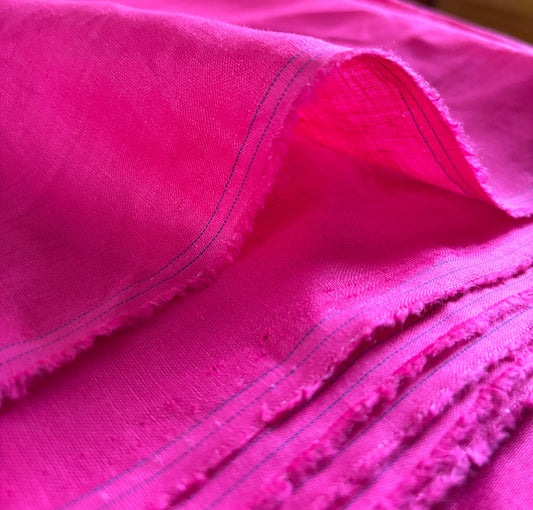 Close-up of a hot pink linen fabric for sale in Singapore