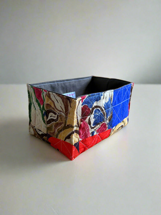 Colorful fabric quilted to make a unique fabric storage basket for sale