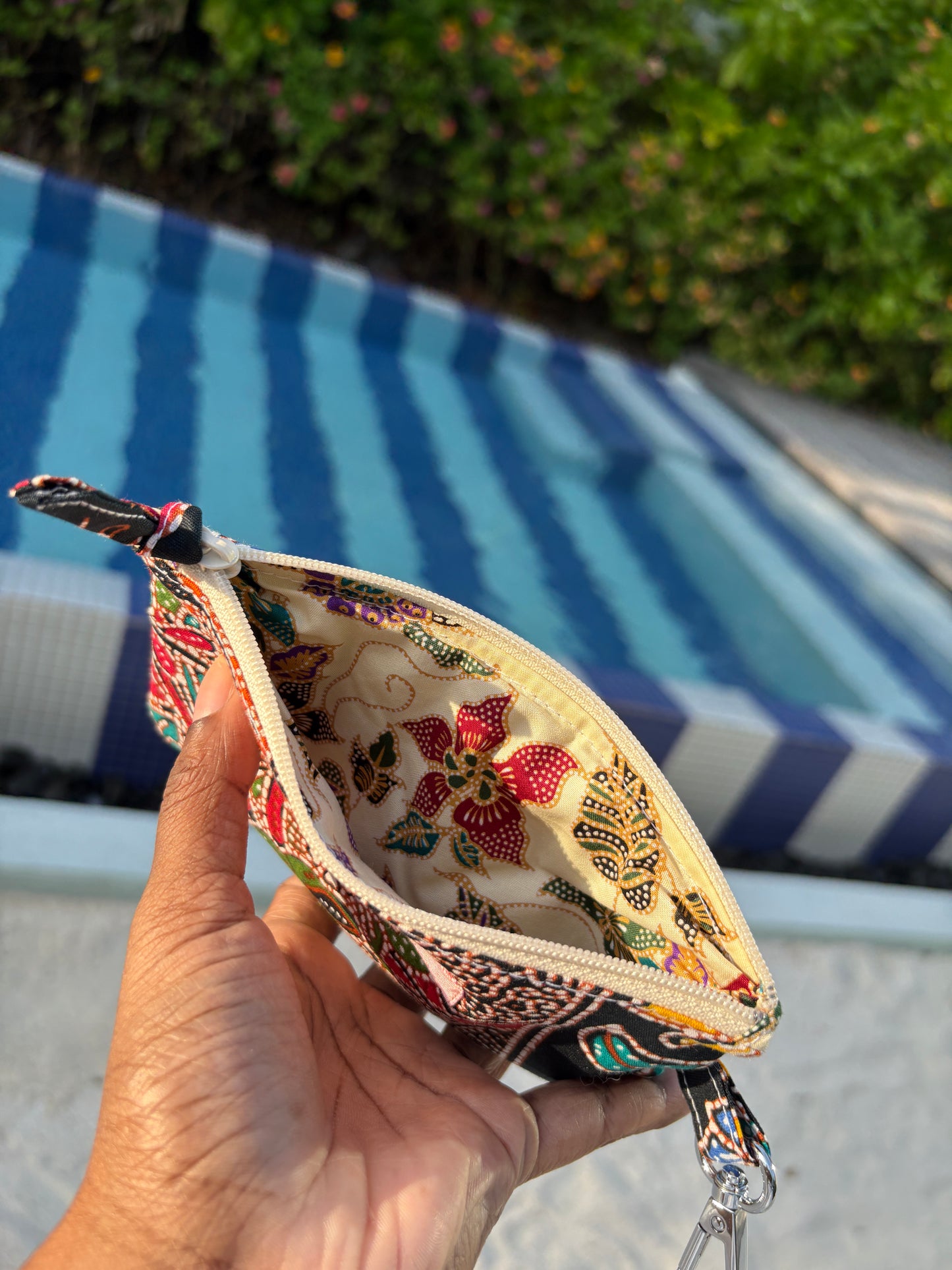 Handmade in Singapore black and red Batik purse with YKK zipper and lobster clasp.