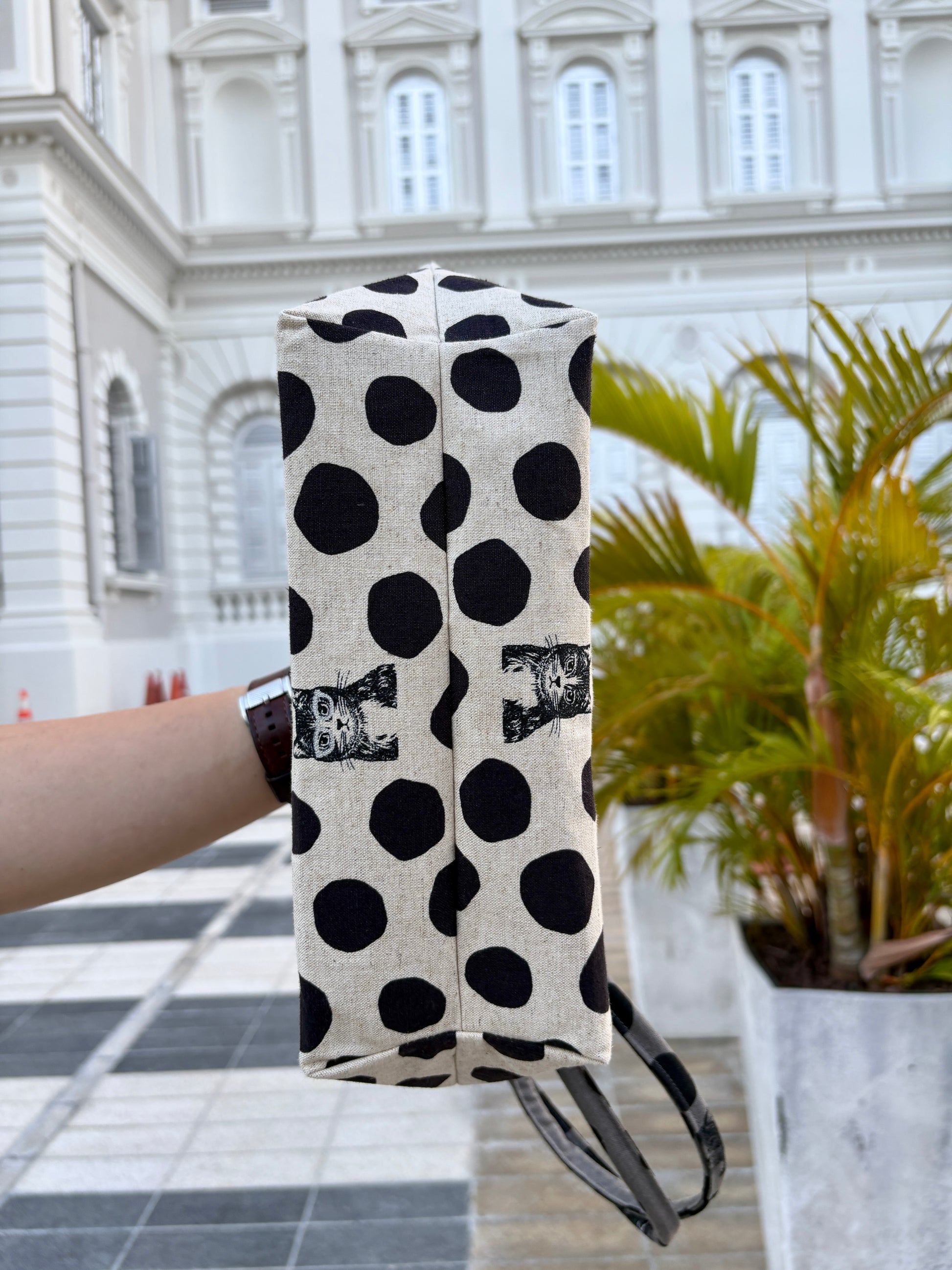 Polka dot handbag made from Japanese canvas featuring a cat print, handmade in Singapore. Finished with a YKK zipper and leather zipper puller.