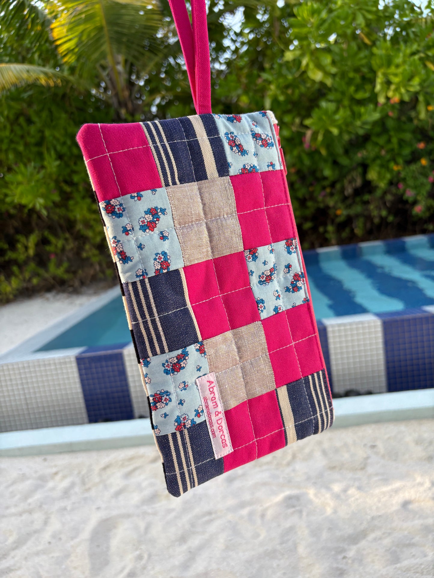 Handcrafted clutch featuring silk, Liberty of London, Japanese denim and canvas fabric, made in Singapore.