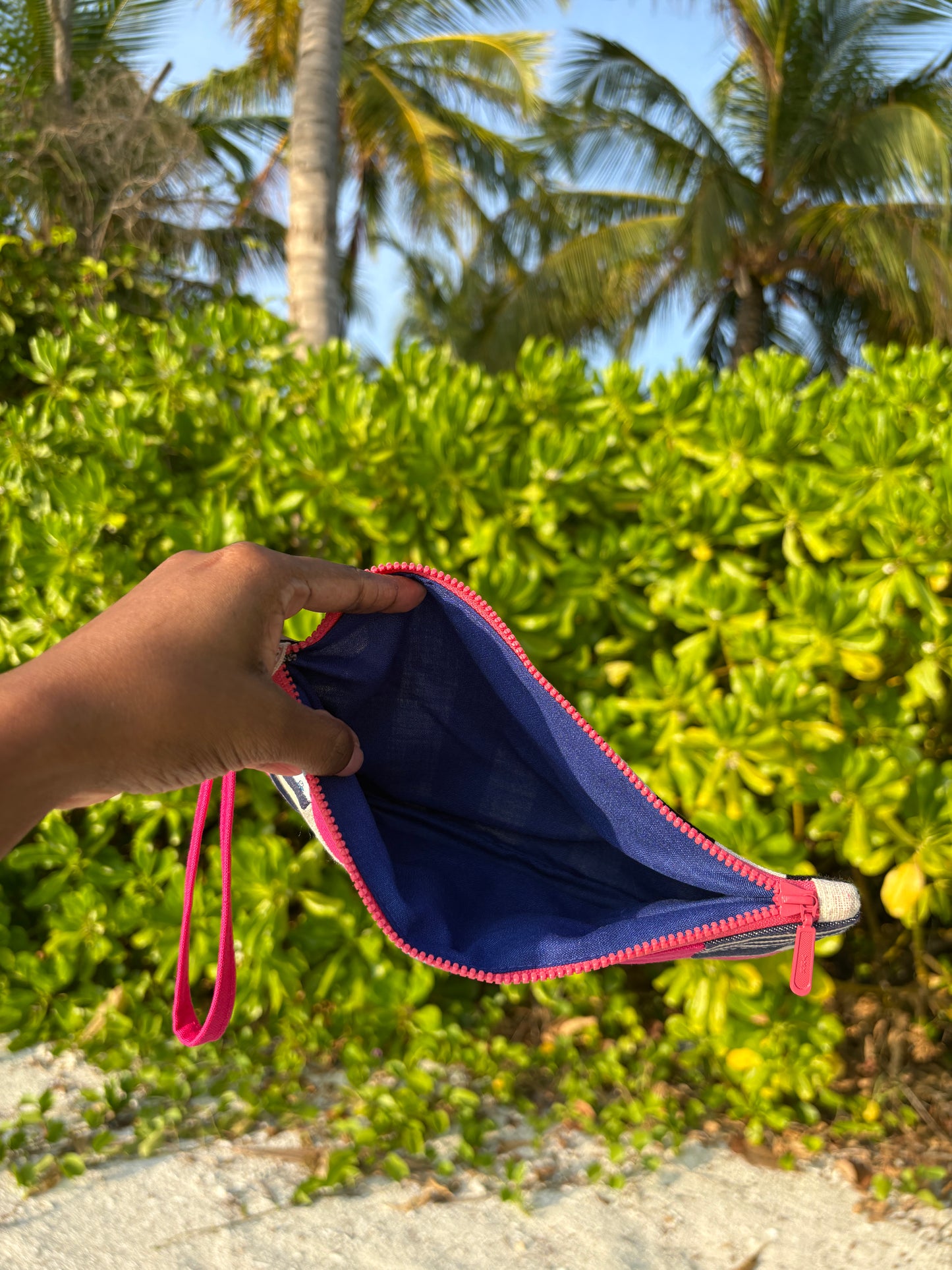 Handcrafted clutch featuring silk, Liberty of London, Japanese denim and canvas fabric, made in Singapore.