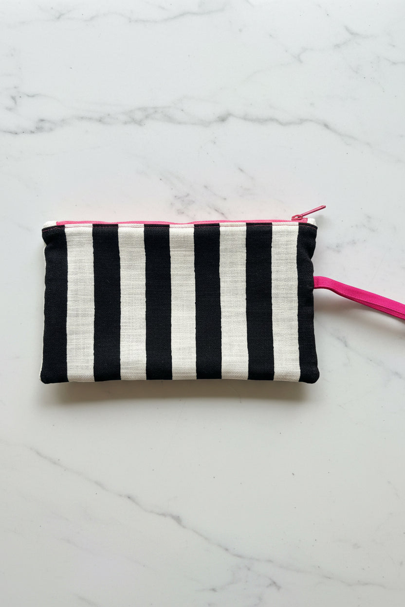 Handcrafted clutch featuring silk, Liberty of London, Japanese denim and canvas fabric, made in Singapore.