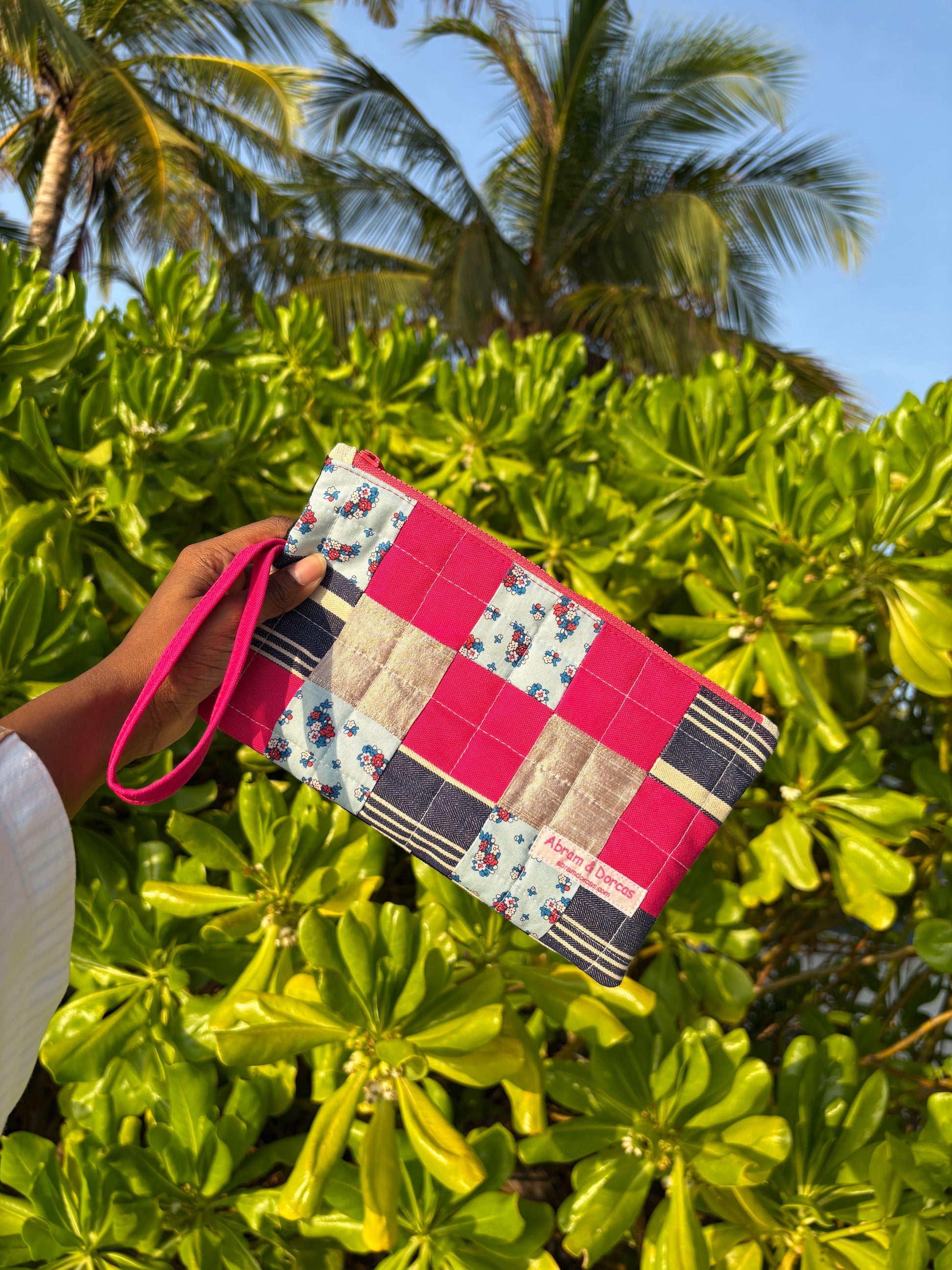 Handcrafted clutch featuring silk, Liberty of London, Japanese denim and canvas fabric, made in Singapore.