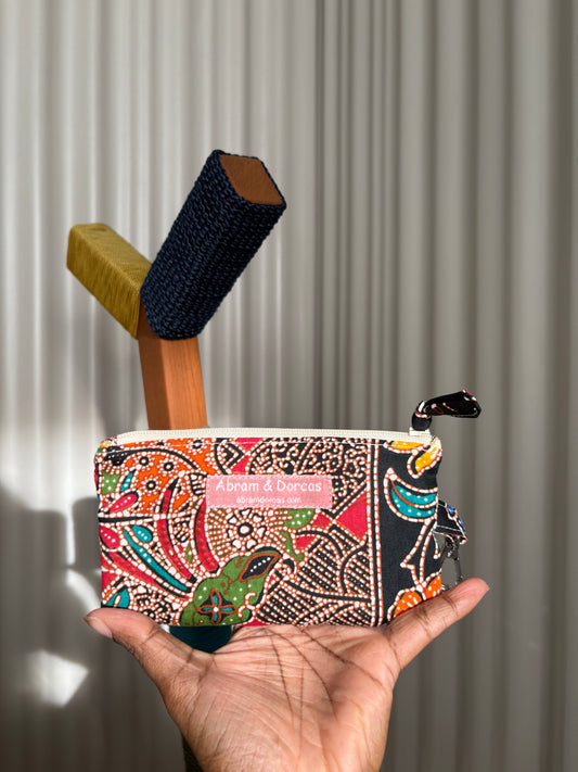 Handmade in Singapore black and red Batik purse with YKK zipper and lobster clasp.