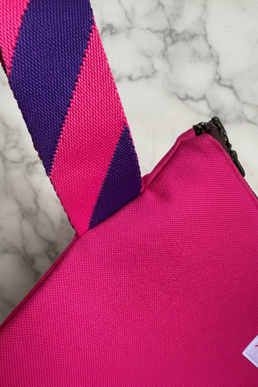 Bright pink laptop sleeve made from Japanese canvas, can fit 13 or 14 inch laptops, handmade in Singapore.