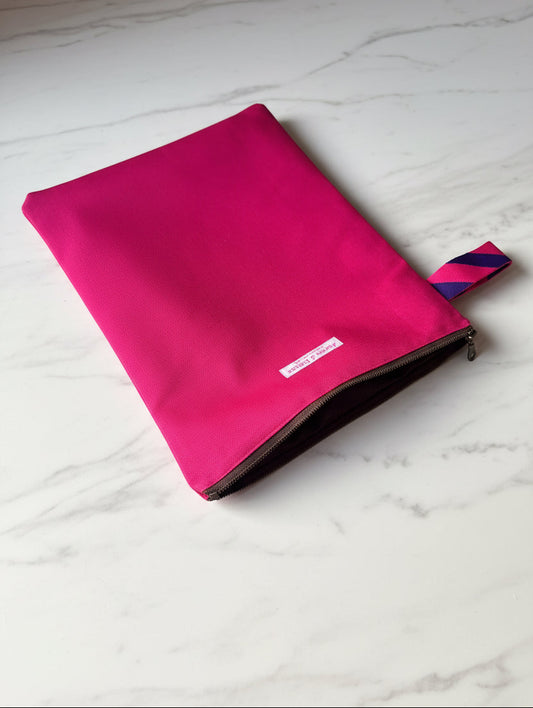 Bright pink laptop sleeve made from Japanese canvas, can fit 13 or 14 inch laptops, handmade in Singapore.