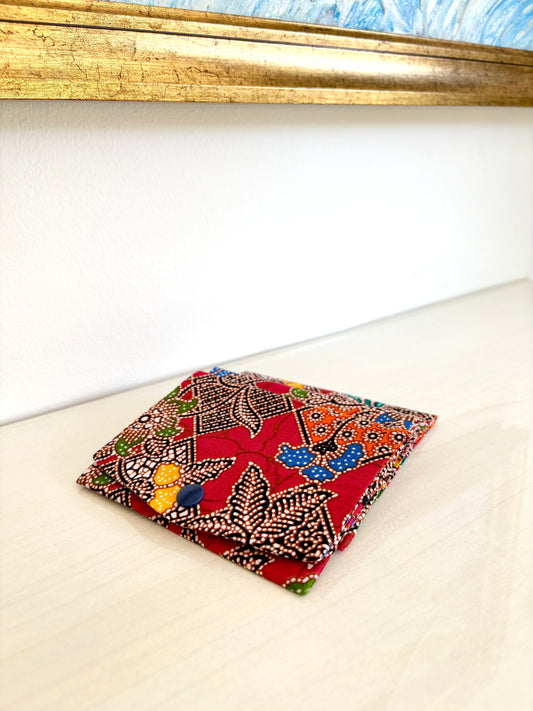 Red Batik tissue holder pouch made from cotton Batik and snap closure, handmade in Singapore.