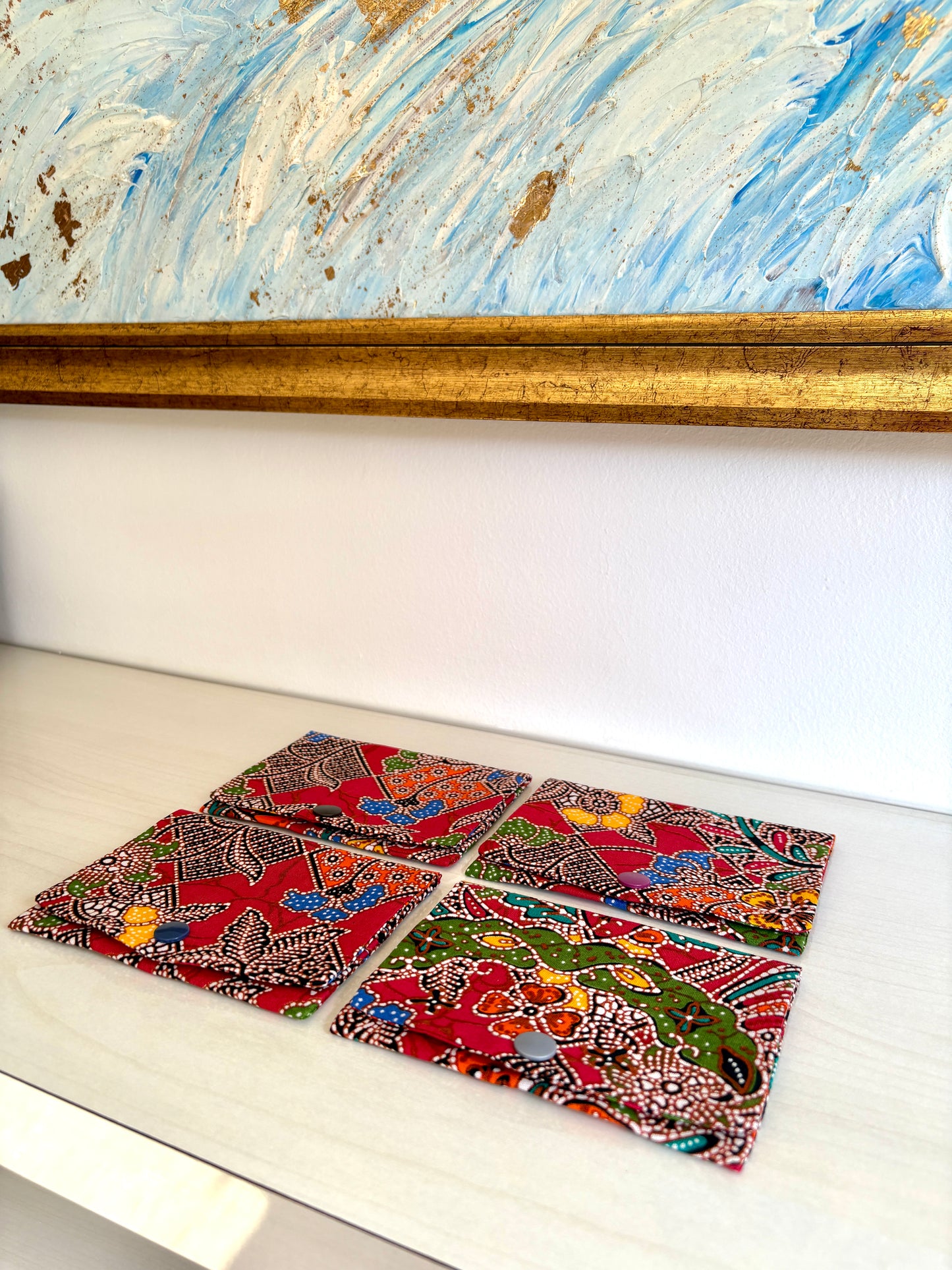 Red Batik tissue holder pouch made from cotton Batik and snap closure, handmade in Singapore.