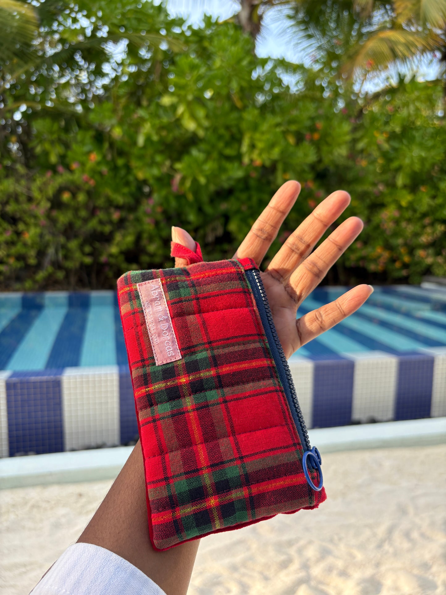 Red tartan and velvet with blue YKK zipper pouch handmade in Singapore.