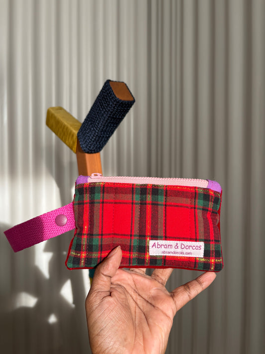 Red tartan and velvet YKK zipper pouch with pink strap handmade in Singapore.