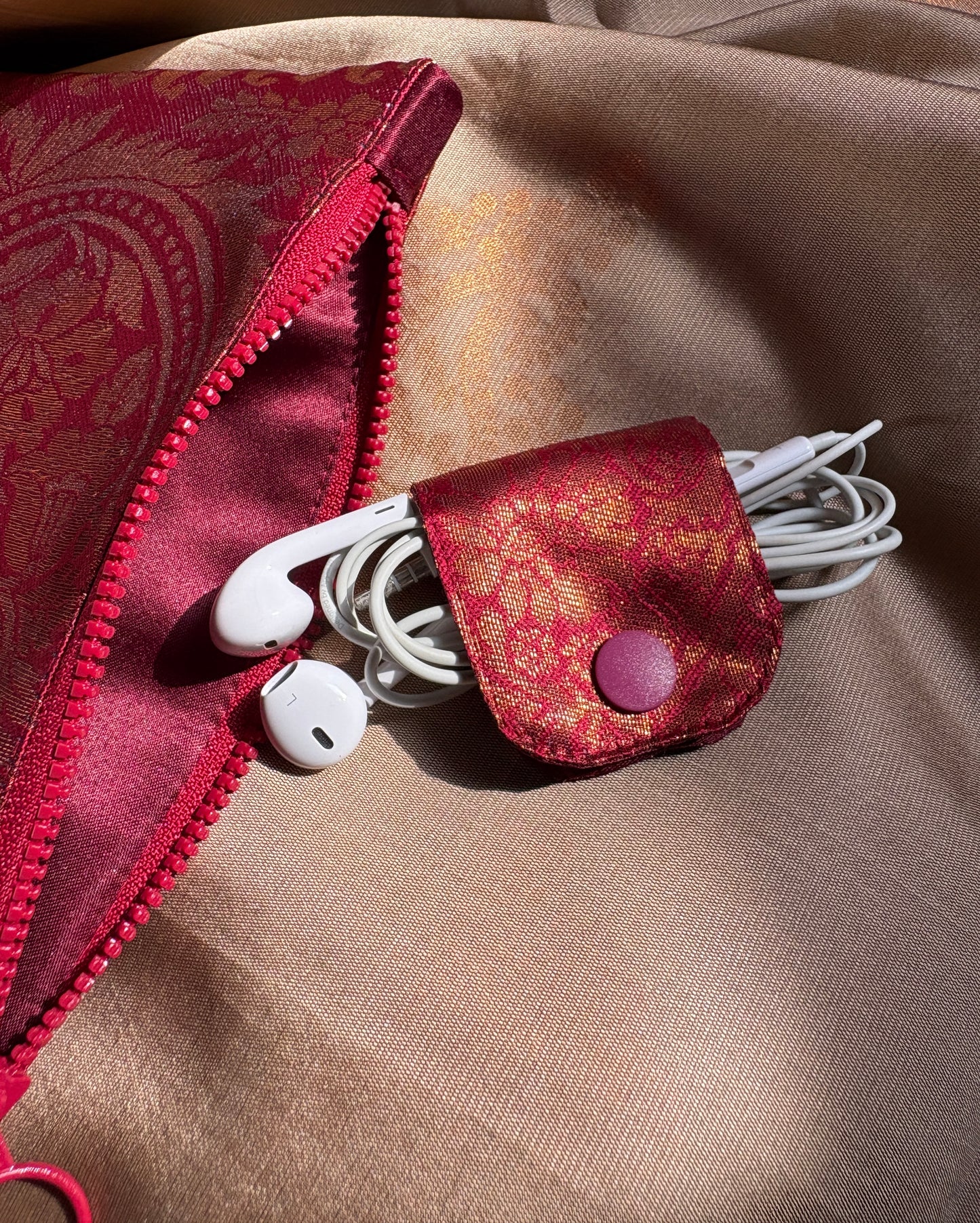 Red zipper pouch and cable organiser handmade in Singapore with sari fabric 